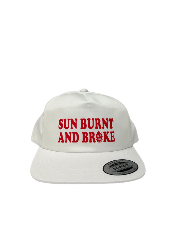 SUN BURNT AND BROKE HAT